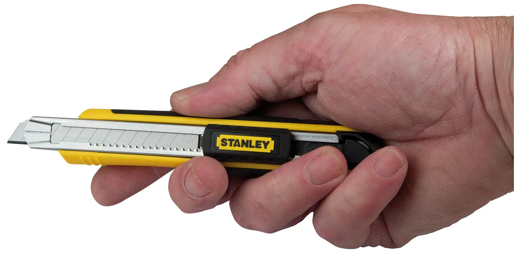 STANLEY 10-475 utility knife with yellow and black handle held in a hand, side angle.