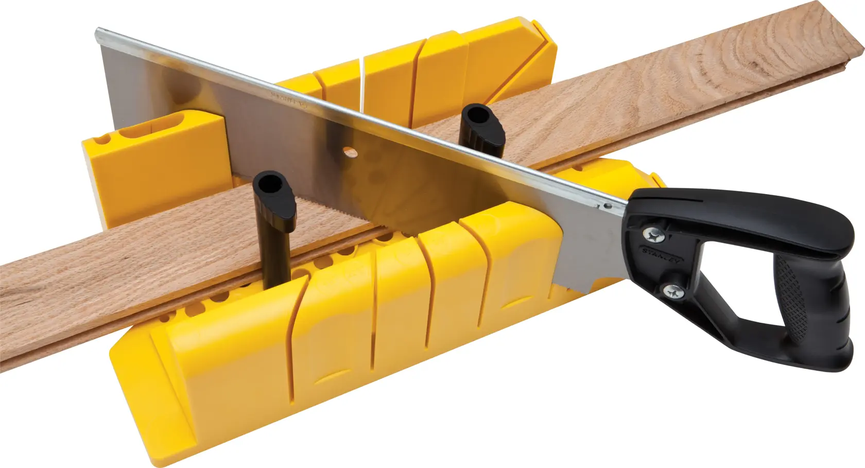 STANLEY 20-600 hand saw and yellow miter box cutting wood strip, angled view, woodworking tool.